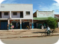 Our accommodation in Lubumbashi, with pastors Eddie and Millan sitting in the sun